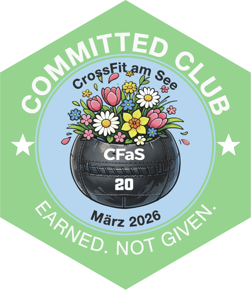 Committed-Club-Abzeichen März 2026: Wall Ball mit einem Blumenstrauß obenauf